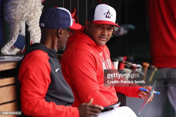 Manager Dave Martinez of the Washington Nationals sits in the dugout against the Chicago Cubs at Nationals Park on May 04, 2023 in Washington, DC.