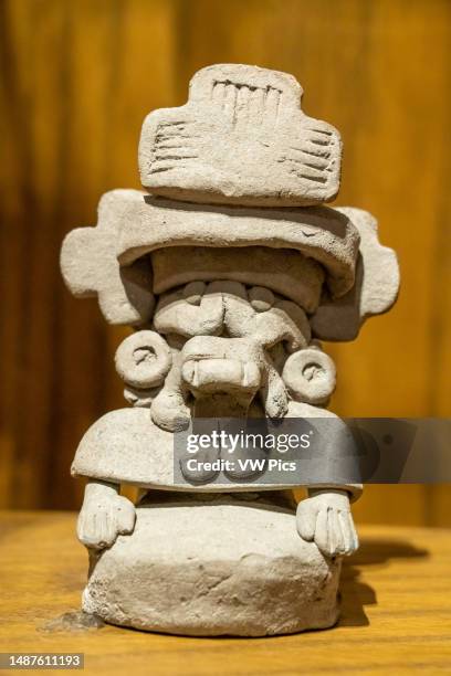 Pre-Hispanic Zapotec ceramic figure of Cocijo, the Rain God, in the Museum of Oaxacan Culture, Oaxaca, Mexico.