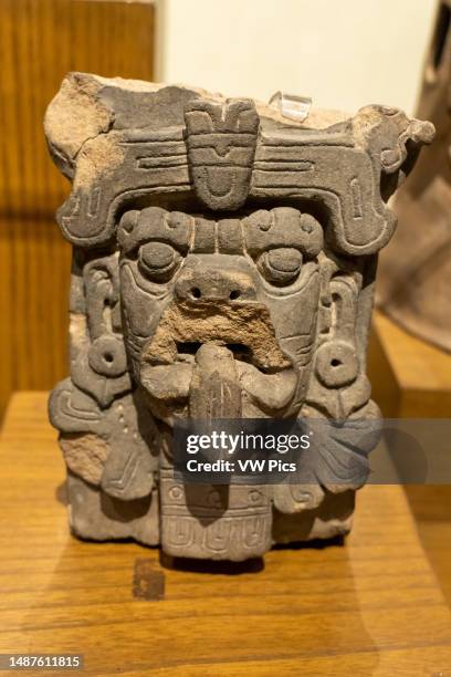 Pre-Hispanic ceramic Zapotec funerary figure of Cocijo, the god of rain, in the Museum of Oaxacan Culture, Oaxaca, Mexico.