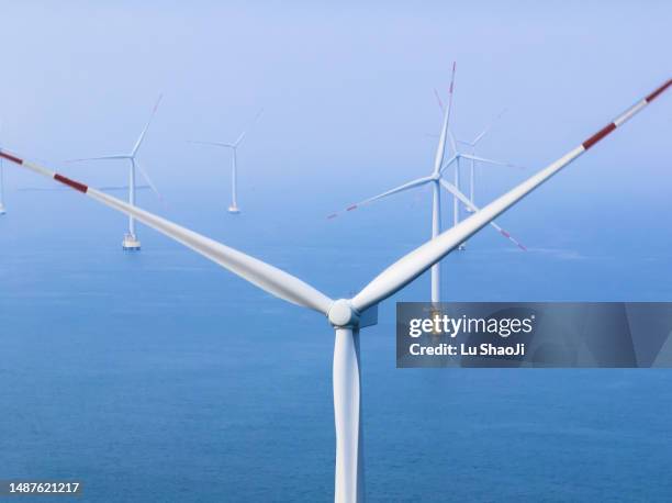 offshore wind farm in the sea. - low carbon technology stockfoto's en -beelden