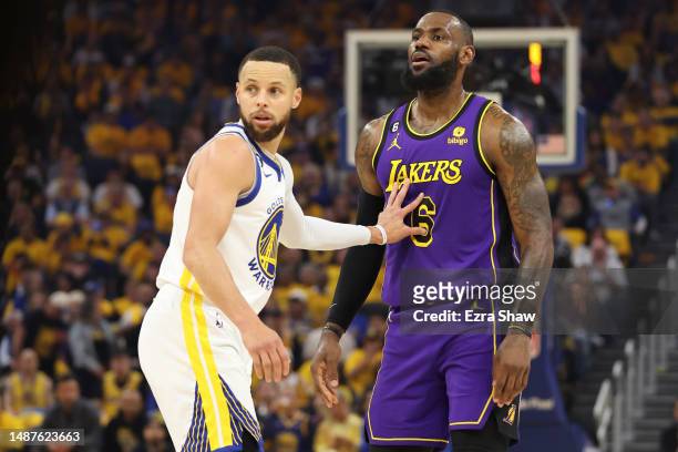 Stephen Curry of the Golden State Warriors defends LeBron James of the Los Angeles Lakers during the first quarter in game two of the Western...