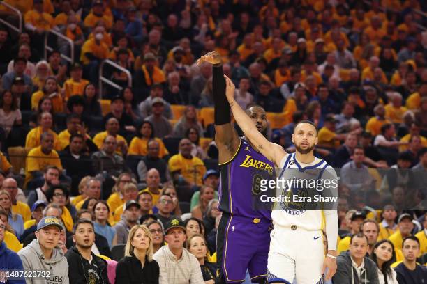 Stephen Curry of the Golden State Warriors defends LeBron James of the Los Angeles Lakers during the first quarter in game two of the Western...
