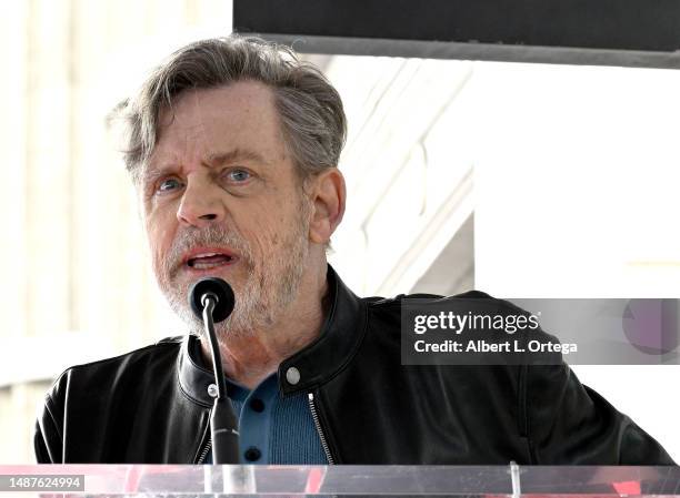 Mark Hamill speaks onstage during the ceremony for Carrie Fisher being honored posthumously with a Star on the Hollywood Walk of Fame on May 04, 2023...