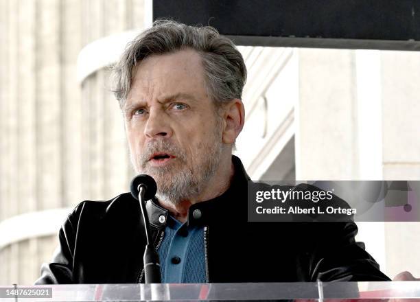 Mark Hamill speaks onstage during the ceremony for Carrie Fisher being honored posthumously with a Star on the Hollywood Walk of Fame on May 04, 2023...