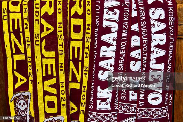 football supporter scarves for sale displayed outside shop in bascarsija, the old turkish quarter. - football scarf stock pictures, royalty-free photos & images