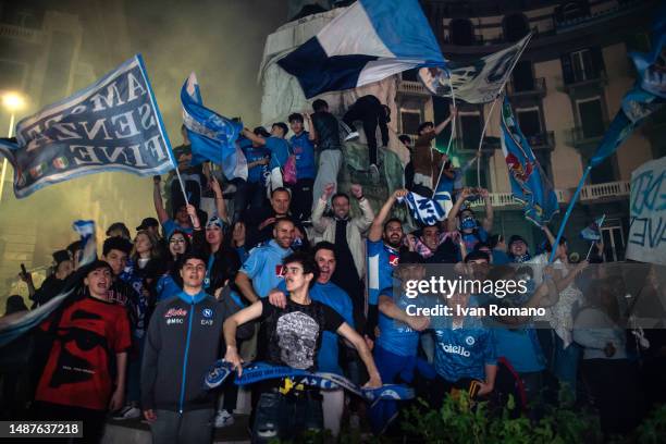 Napoli fans celebrate after winning the Serie A championship on May 04, 2023 in Naples, Italy. SSC Napoli are Champions of Italy after thirty three...