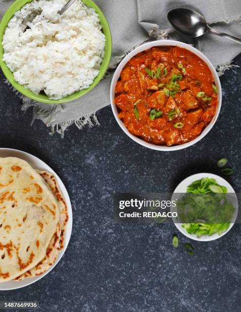 Chicken Tika. Chicken. Goulash. Basmati Rise. Background. Bowl. Bread. Butter. Butter Chicken. Canada. Close-up. Cooked. Cooking. Copy Space....