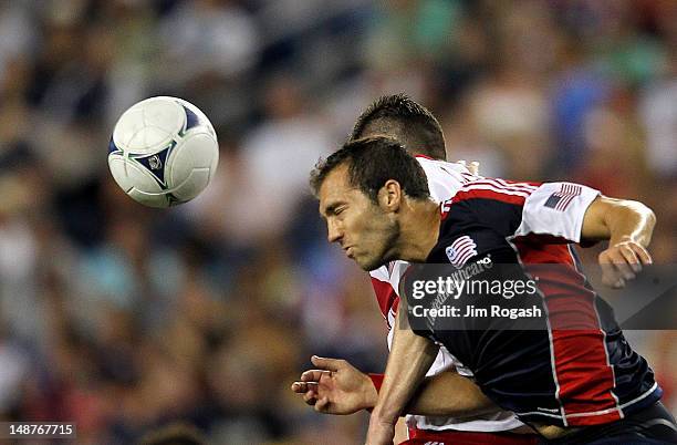 Soares of the New England Revolution heads the ball against the New York Red Bulls at Gillette Stadium July 8, 2012 in Foxboro, Massachusetts.