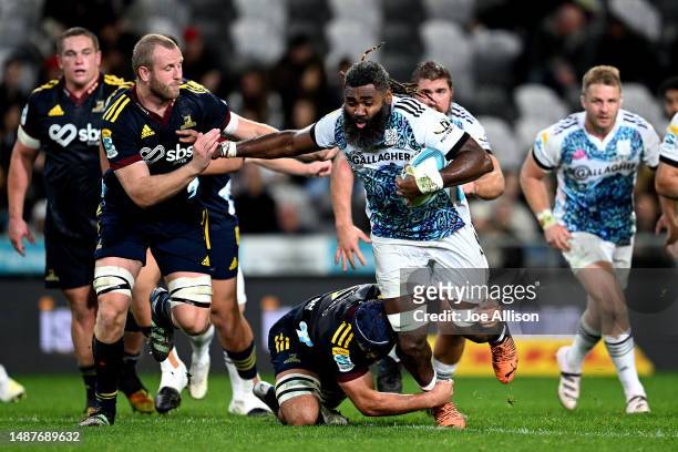 Pita Gus Sowakula of the Chiefs charges forward during the round 11 Super Rugby Pacific match between Highlanders and Chiefs at Forsyth Barr Stadium,...
