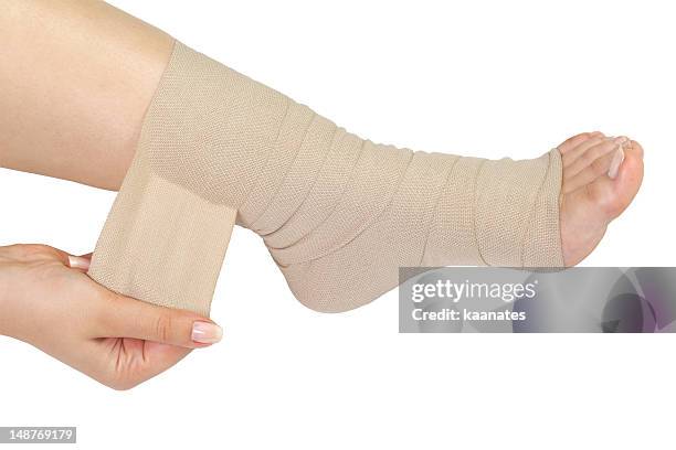bandaged ankle - twisted ankle stock pictures, royalty-free photos & images