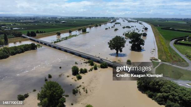 hawkes bay, new zealand, flooded river. - flood stock pictures, royalty-free photos & images