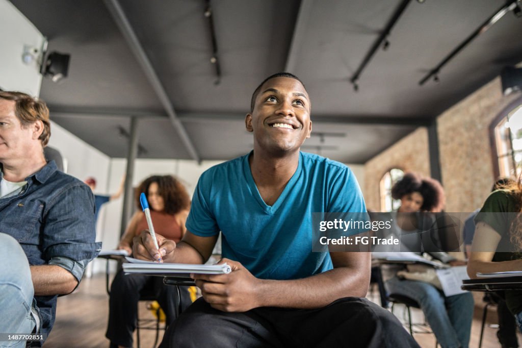 Student paying attention during class in the university