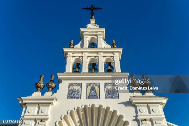 tower and bell tower of the sanctuary of nuestra señora del rocio, almonte, huelva, andalusia, spain - ubicaciones geográficas stock pictures, royalty-free photos & images