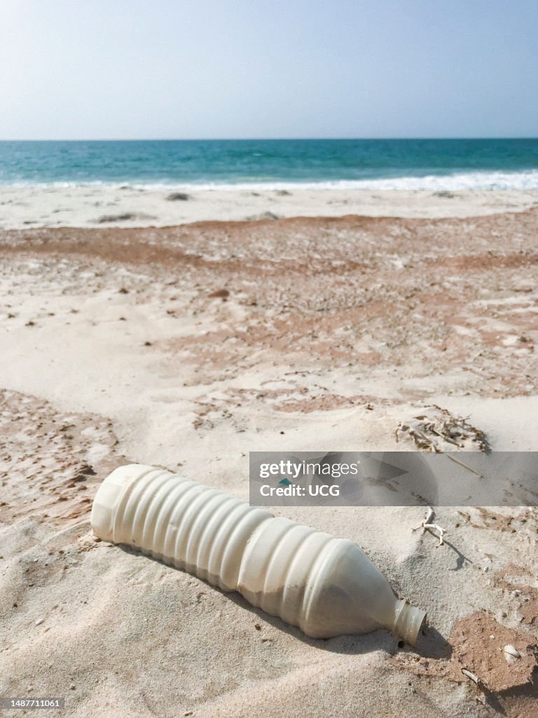 Mauritania, Nouakchott, plastic bottle on th beach