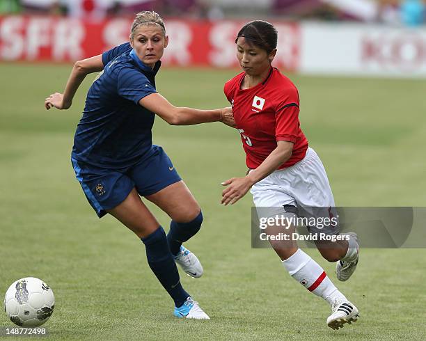 Aya Sameshima of Japan moves past Corine Franco during the friendly international match between Japan Women and France Women at Stade Charlety on...