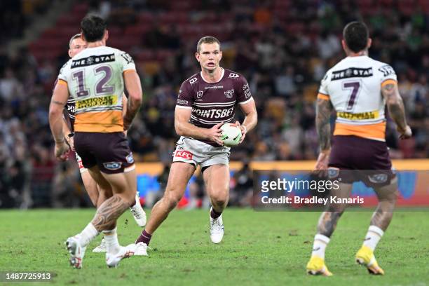Tom Trbojevic of the Sea Eagles runs the ball during the round 10 NRL match between Manly Sea Eagles and Brisbane Broncos at Suncorp Stadium on May...