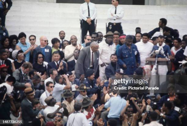 Civil rights activists at the lectern during the Poor People's March on Washington from the Lincoln Memorial on the National Mall, in Washington DC,...