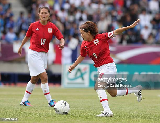 Aya Miyama of Japan runs with the ball during the friendly international match between Japan Women and France Women at Stade Charlety on July 19,...