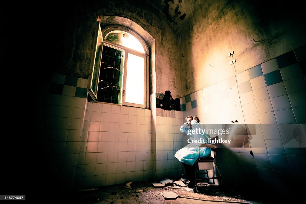 Crazy patient in wheelchair