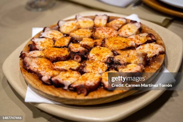 pulpo a la gallega, a galician-style octopus. - pulpo stock pictures, royalty-free photos & images