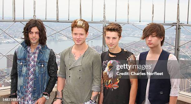 Ian Keaggy, Nash Overstreet, Ryan Follese and Jamie Follese of Hot Chelle Rae visit The Empire State Building on July 19, 2012 in New York City.