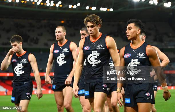 The Blues look dejected after losing the round eight AFL match between Carlton Blues and Brisbane Lions at Marvel Stadium, on May 05 in Melbourne,...