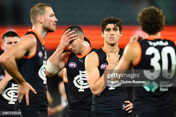 The Blues look dejected after losing the round eight AFL match between Carlton Blues and Brisbane Lions at Marvel Stadium, on May 05 in Melbourne,...