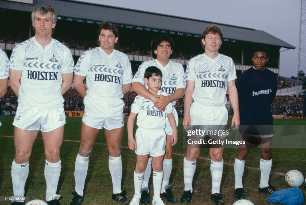 Guest Player Diego Maradona With Spurs Players Graham Roberts Gary guest-player-diego-maradona-with-spurs-players-graham-roberts-gary