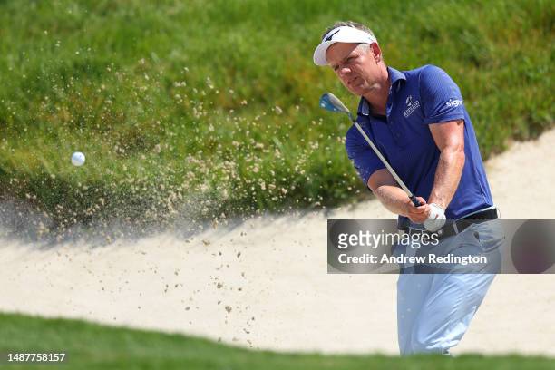 Luke Donald of England plays their third shot out of a bunker on the 5th hole during Day Two of the DS Automobiles Italian Open at Marco Simone Golf...