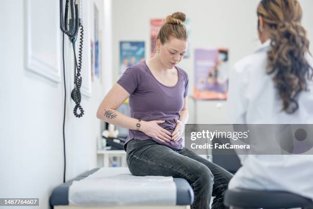 women's health appointment - pélvis imagens e fotografias de stock