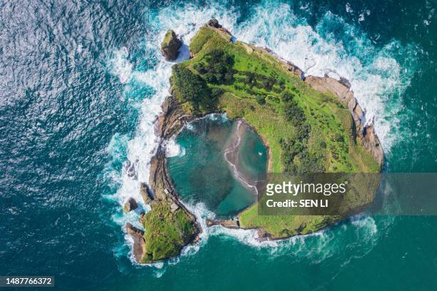aerial view of a volcanic island on the sea of azores, portugal - san miguel portugal stockfoto's en -beelden
