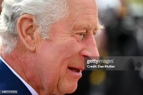 King Charles III greets members of the public along the Mall as preparations continue ahead of the Coronation of King Charles III and Queen Camilla...