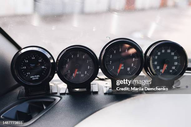 additional sensors for turbocharged motors on car dashboard - ratio stock pictures, royalty-free photos & images