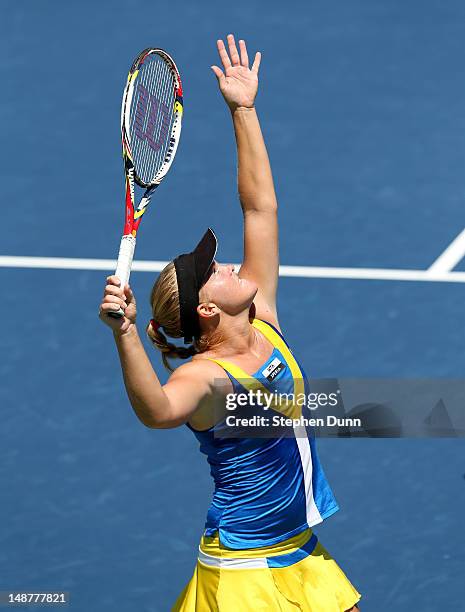 Melanie Oudin serves to Urszula Radwanska of Poland during day six of the Mercury Insurance Open Presented By Tri-City Medical at La Costa Resort &...