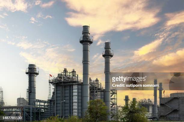 gas turbine electrical power plant in the sunset time - gas plant sunset stock-fotos und bilder