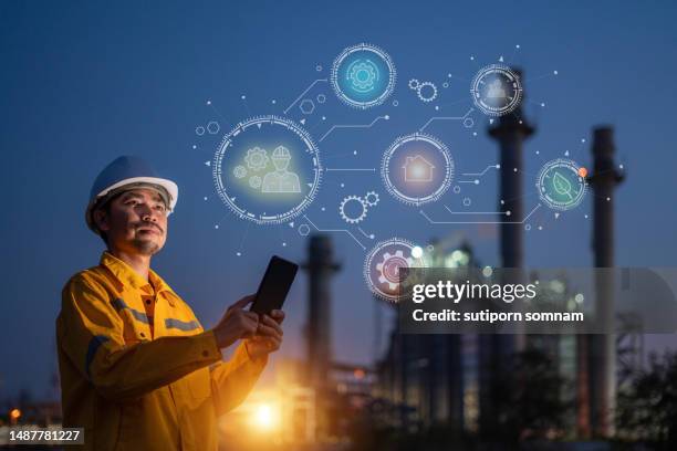 engineering working at gas turbine electrical power plant industrial and intelligent factory industrial. - gas turbine electrical power plant stock pictures, royalty-free photos & images