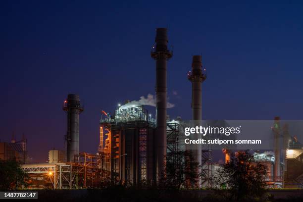 gas turbine electrical power plant energy supply with twilight - gas turbine electrical power plant stock pictures, royalty-free photos & images