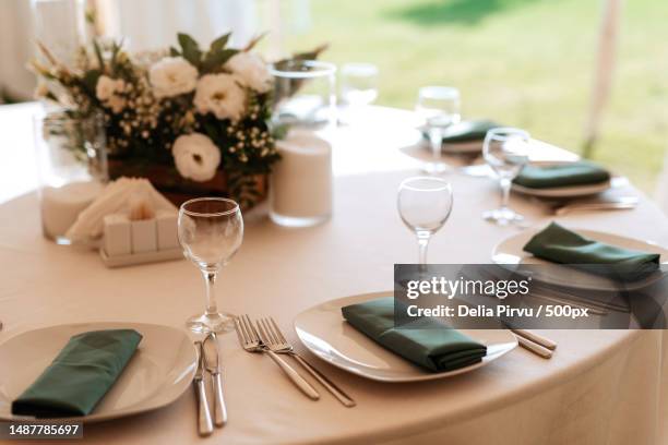 high angle view of place setting on dining table,romania - wedding table setting imagens e fotografias de stock