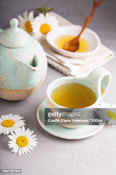 camomille tea in handmade ceramic cup - camomille bildbanksfoton och bilder