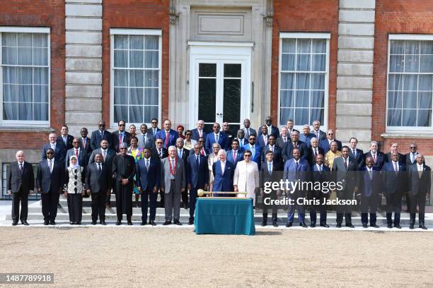 King Charles III poses with Commonwealth leaders at the Commonwealth heads of government leaders meeting at Marlborough House on May 05, 2023 in...