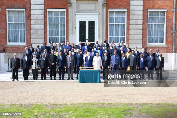 King Charles III poses with Commonwealth leaders at the Commonwealth heads of government leaders meeting at Marlborough House on May 05, 2023 in...