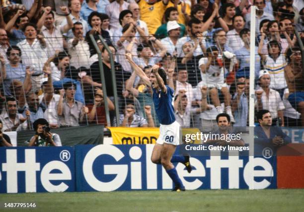 Italy striker Paolo Rossi celebrates after scoring the opening goal in the 1982 FIFA World Cup Final match against West Germany on July 11th at the...