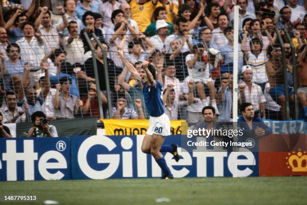 Italy striker Paolo Rossi celebrates after scoring the opening goal in the 1982 FIFA World Cup Final match against West Germany on July 11th at the...