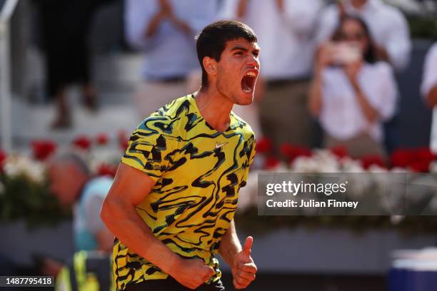 Carlos Alcaraz of Spain celebrates match point against Borna Coric of Croatia during the Men's Singles Semi-Final match on Day Twelve of the Mutua...