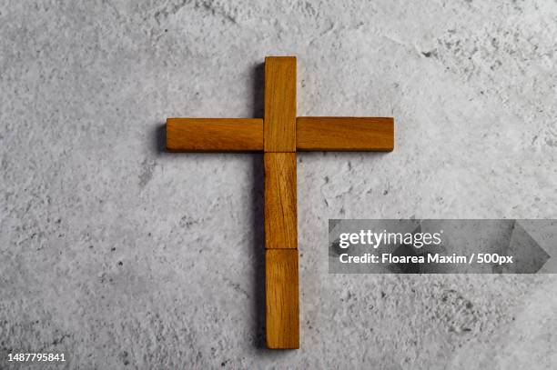 directly above shot of cross on wall,romania - crucifixion stock-fotos und bilder