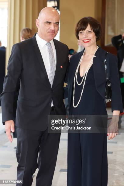 President of the Swiss Confederation, Alain Berset and Muriel Zeender Berset attend the Coronation Reception for overseas guests at Buckingham Palace...