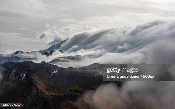 scenic view of mountains against sky - andy dauer stockfoto's en -beelden