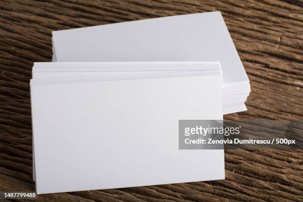 blank white business card presentation of corporate identity on wood background,romania - mockup identity photos et images de collection
