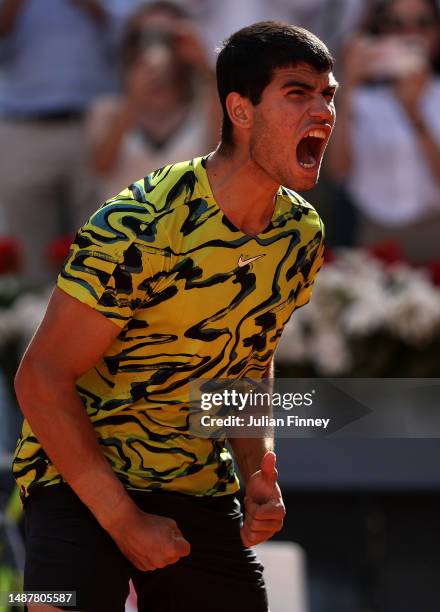 Carlos Alcaraz of Spain celebrates after defeating Borna Coric of Croatia during the Men's Singles Semi-Final match on Day Twelve of the Mutua Madrid...