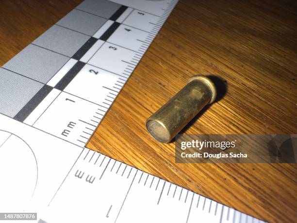 Scale Evidence Forensics 50 Crime Scene Evidence Scale Stock Photos, High-Res Pictures, and ...
